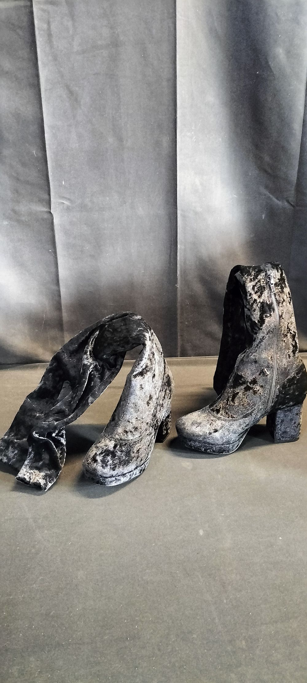 Lot 614: Black velvet knee high heeled boots. Size uk...