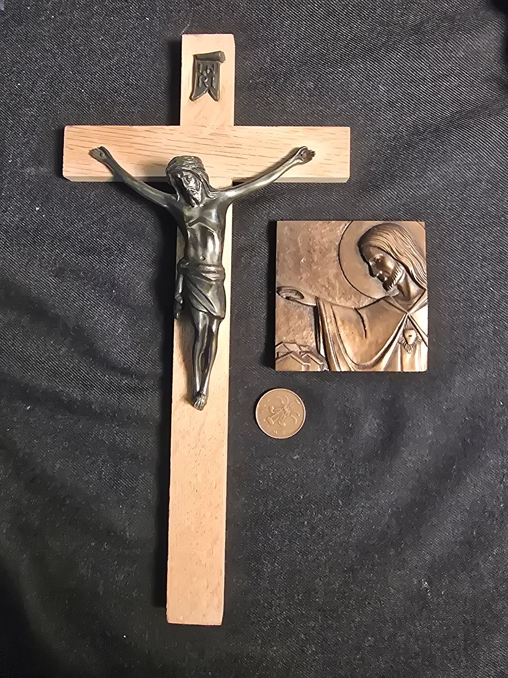 Lot 644: Two religious items including wooden crucifix and bronze wall plaque