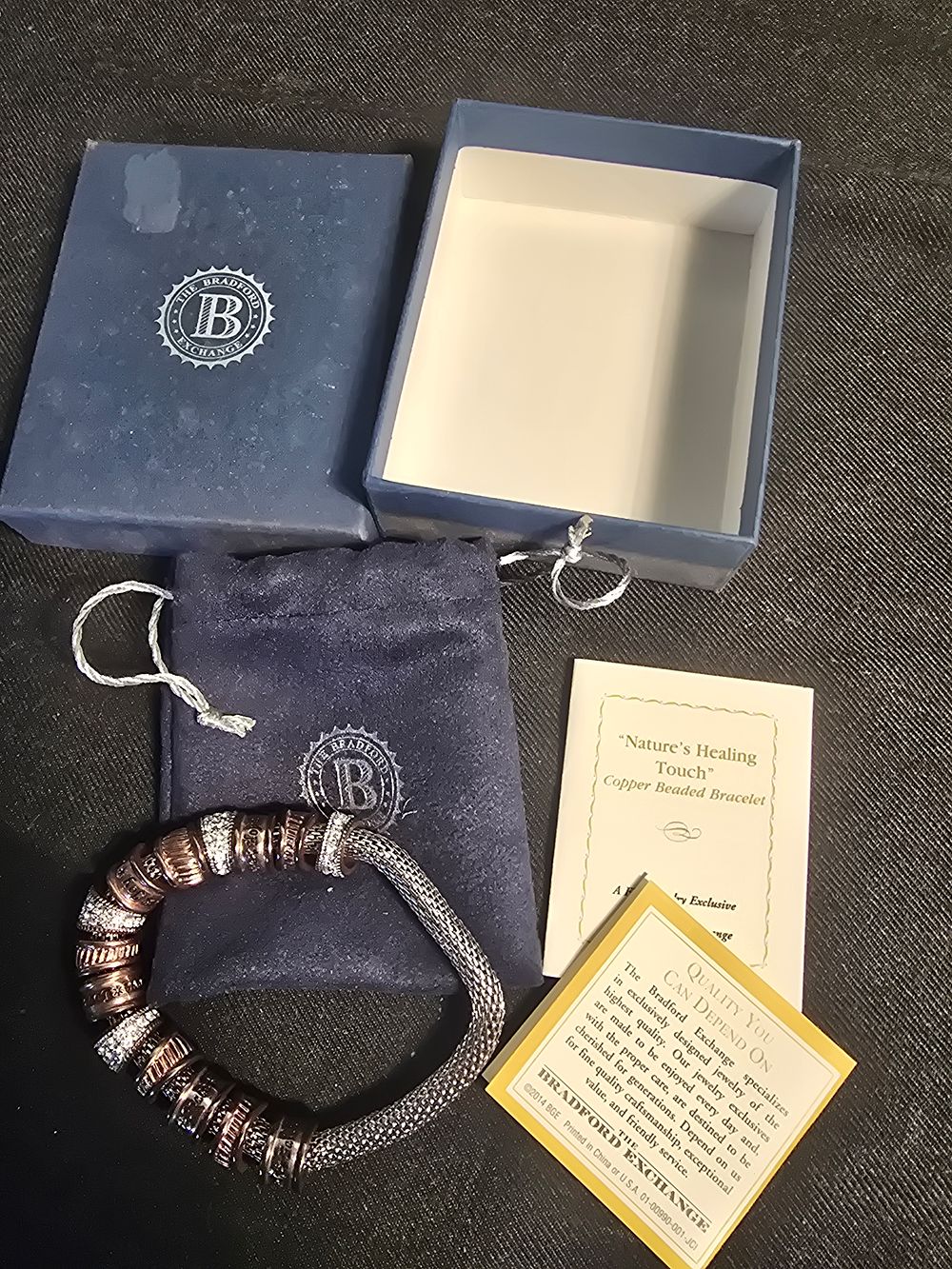 Lot 646: Bradford Exchange Nature's Healing touch copper beaded bracelet