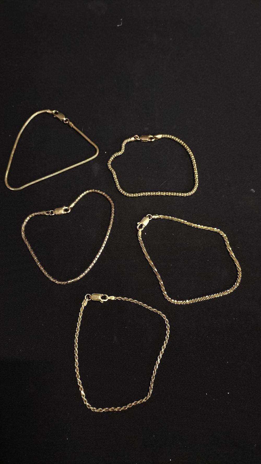 Lot 702: 5 x Gold plated silver bracelets 