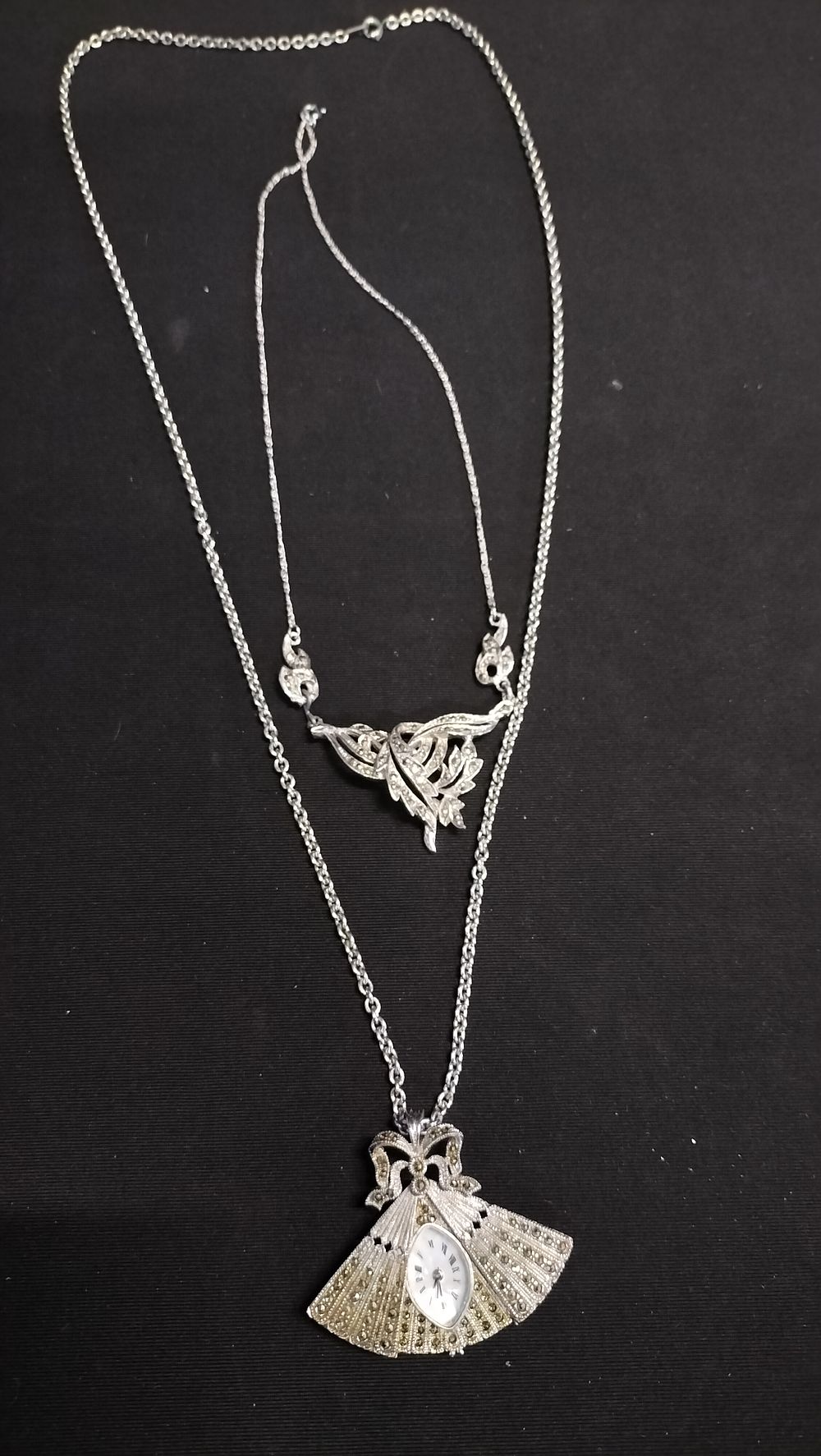 Lot 703: Two marcasite necklaces, one is a fan with...