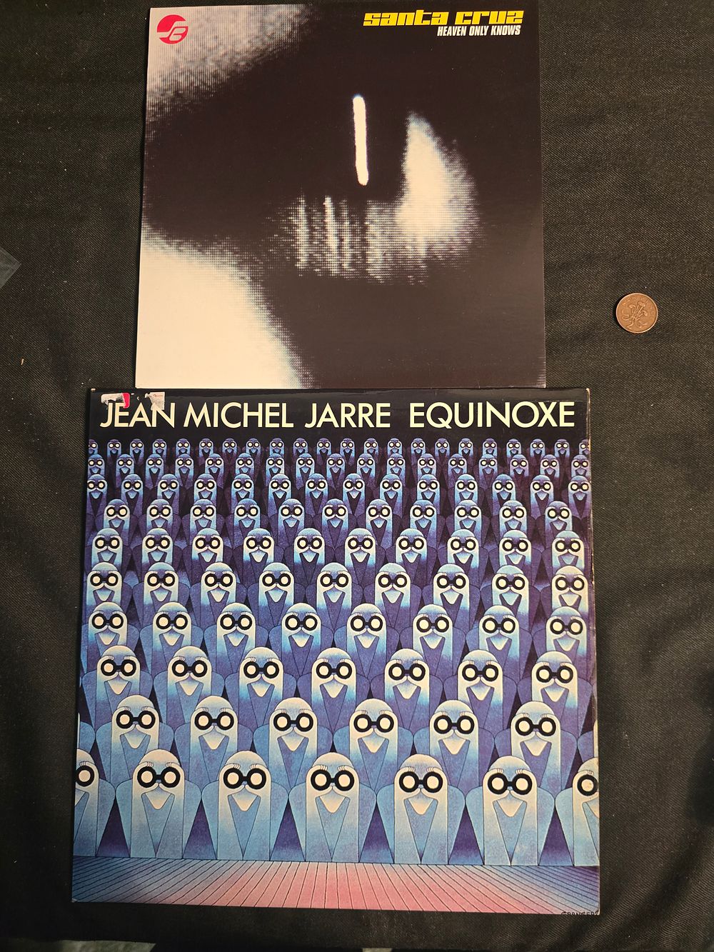 Lot 669: Santa cruz and jean Michael jarre equinox LPs