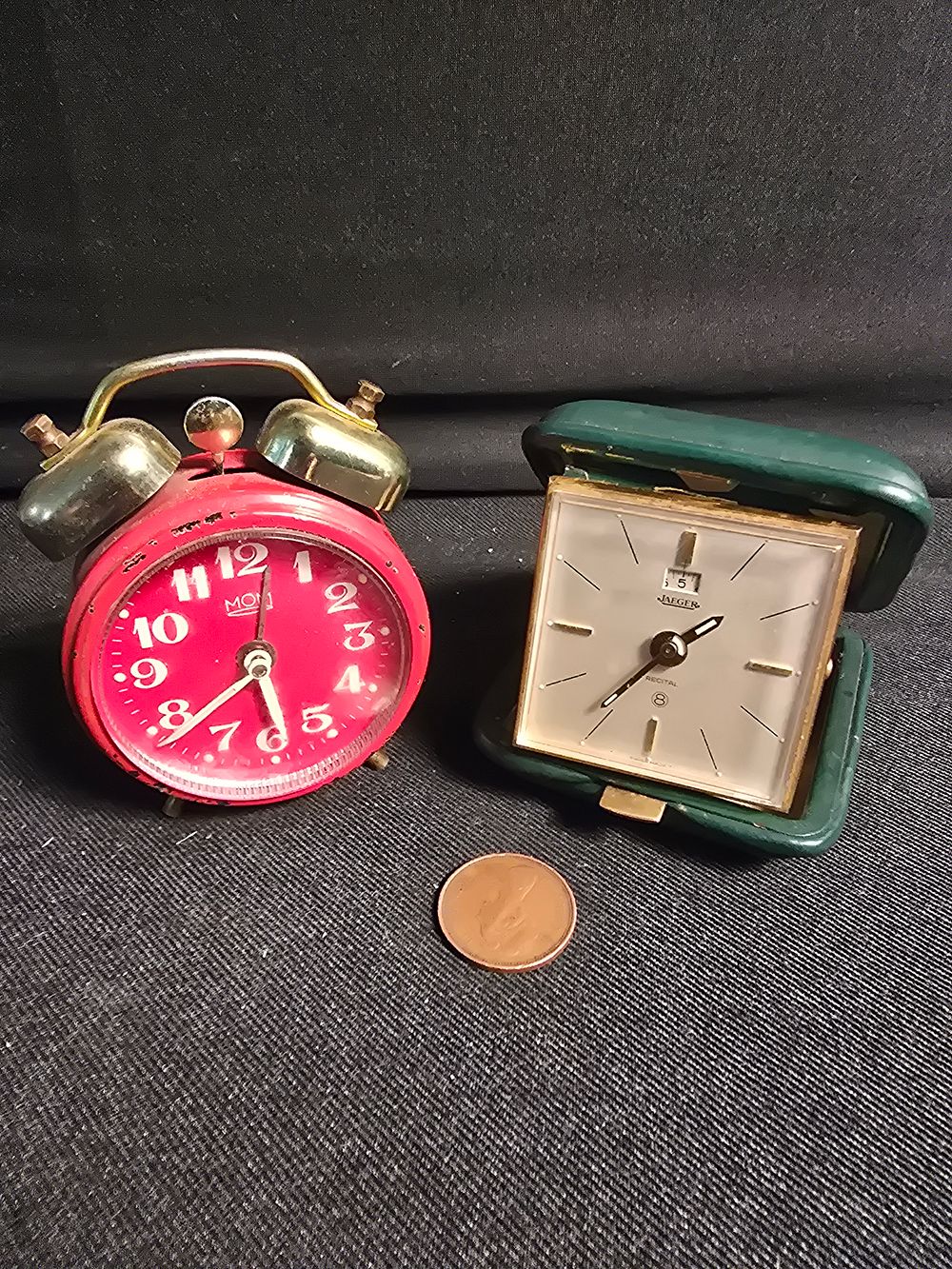 Lot 673: Two vintage travel clocks