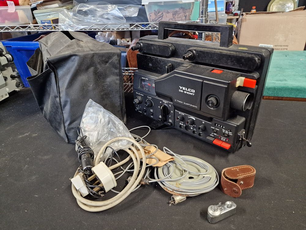 Lot 552: Vintage Yelco DS-810MT 8mm Projector and Accessories a/f