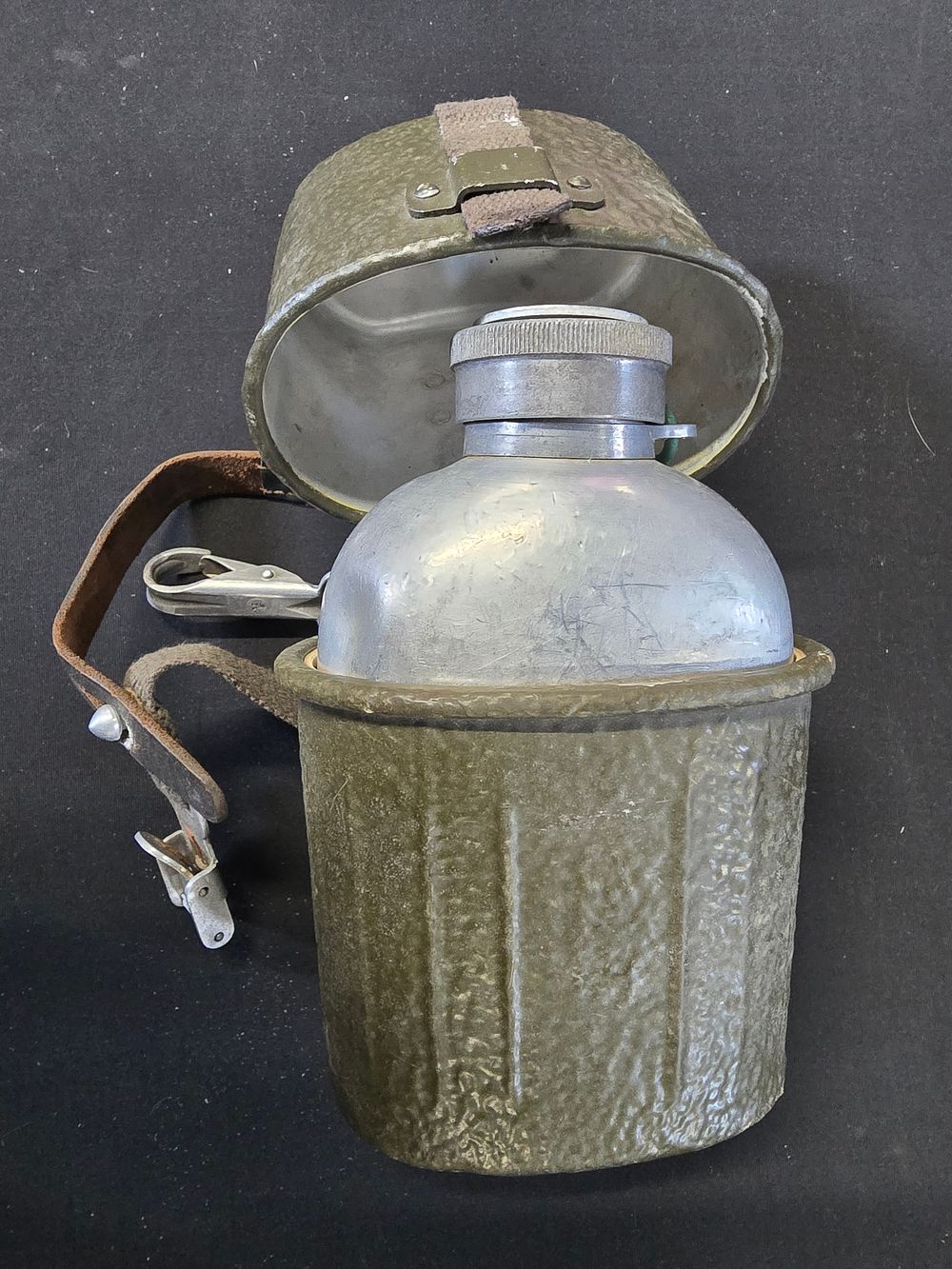 Lot 564: Vintage military canteen and outer casing
