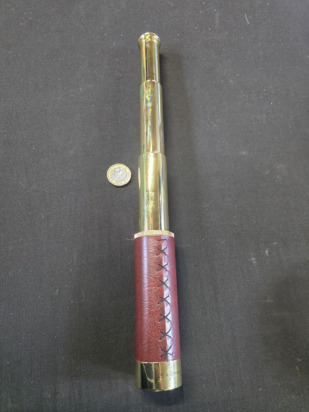 Lot 566: Monocular with leather handle