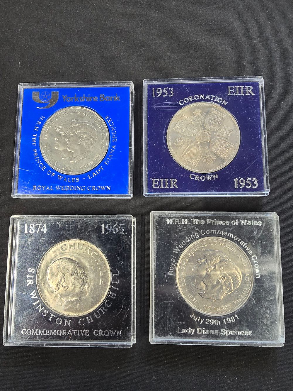 Lot 574: Four vinatge commerative coins 1953 - 1981