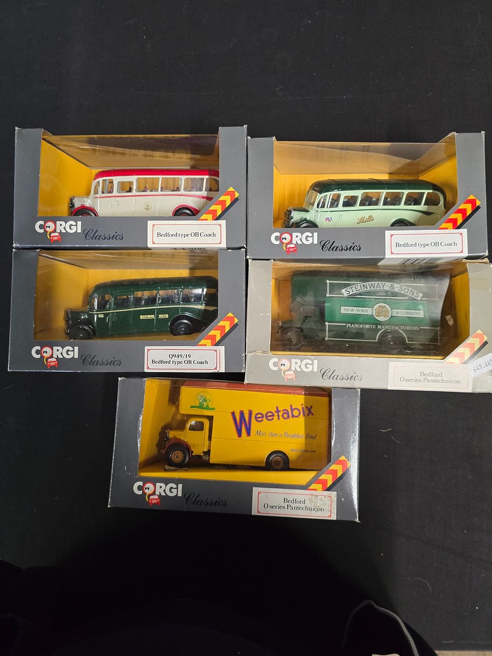 Lot 589: Five.collextabke corgi classis. Coaches and buses and. Weetabix...