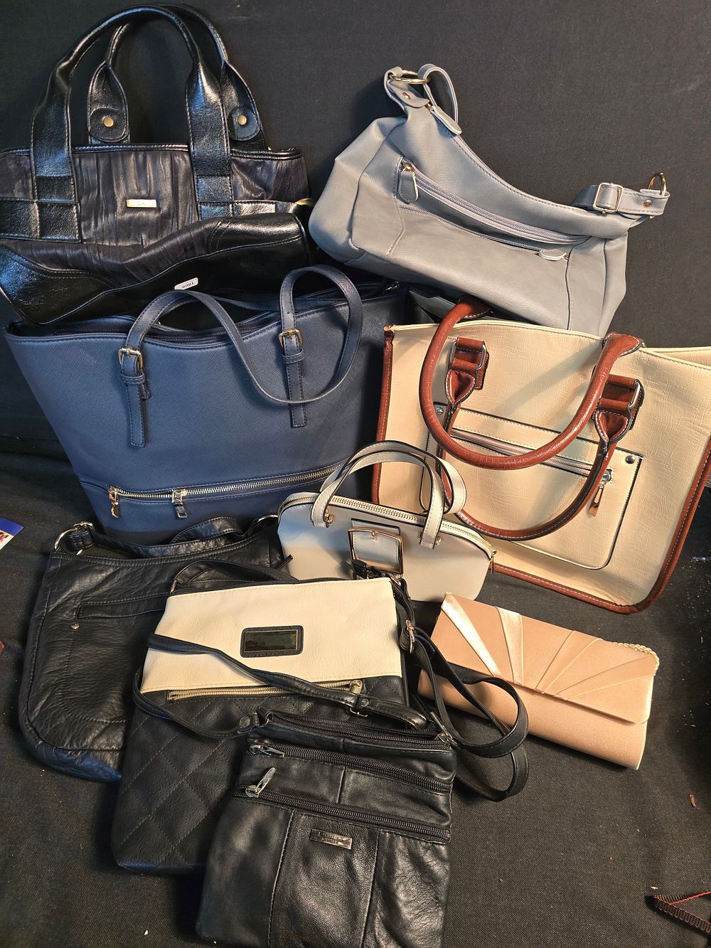 Lot 613: A selection of 9 ladies handbags all in...