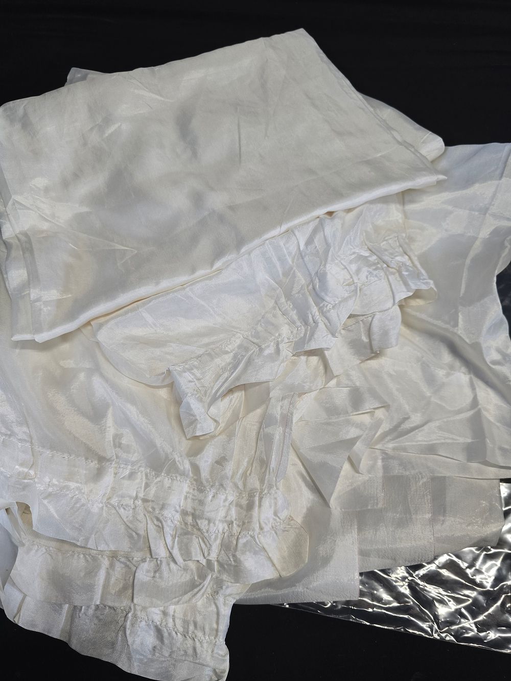 Lot 640: A long rare pair of vintage cream cream...
