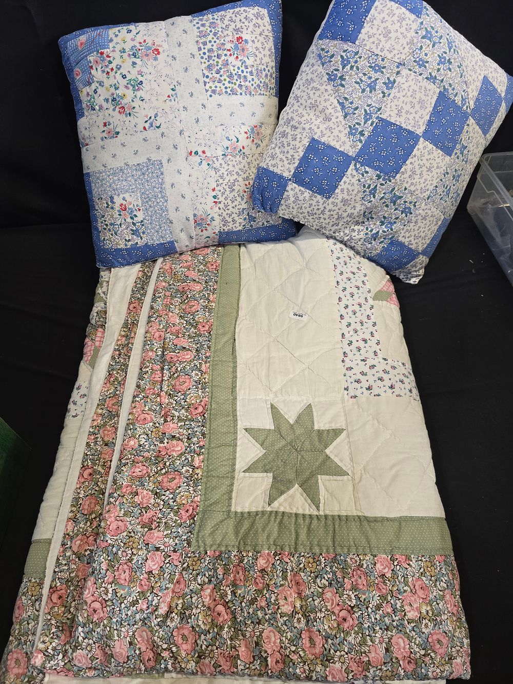Lot 641: A hand hand made pair of quilted cushions...