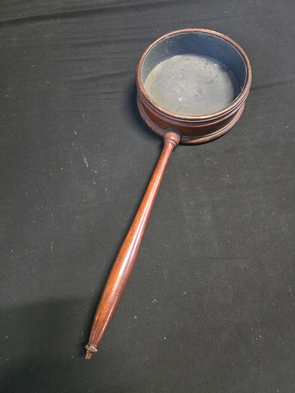 Lot 656: Solid wood long handled religious church collection tray.