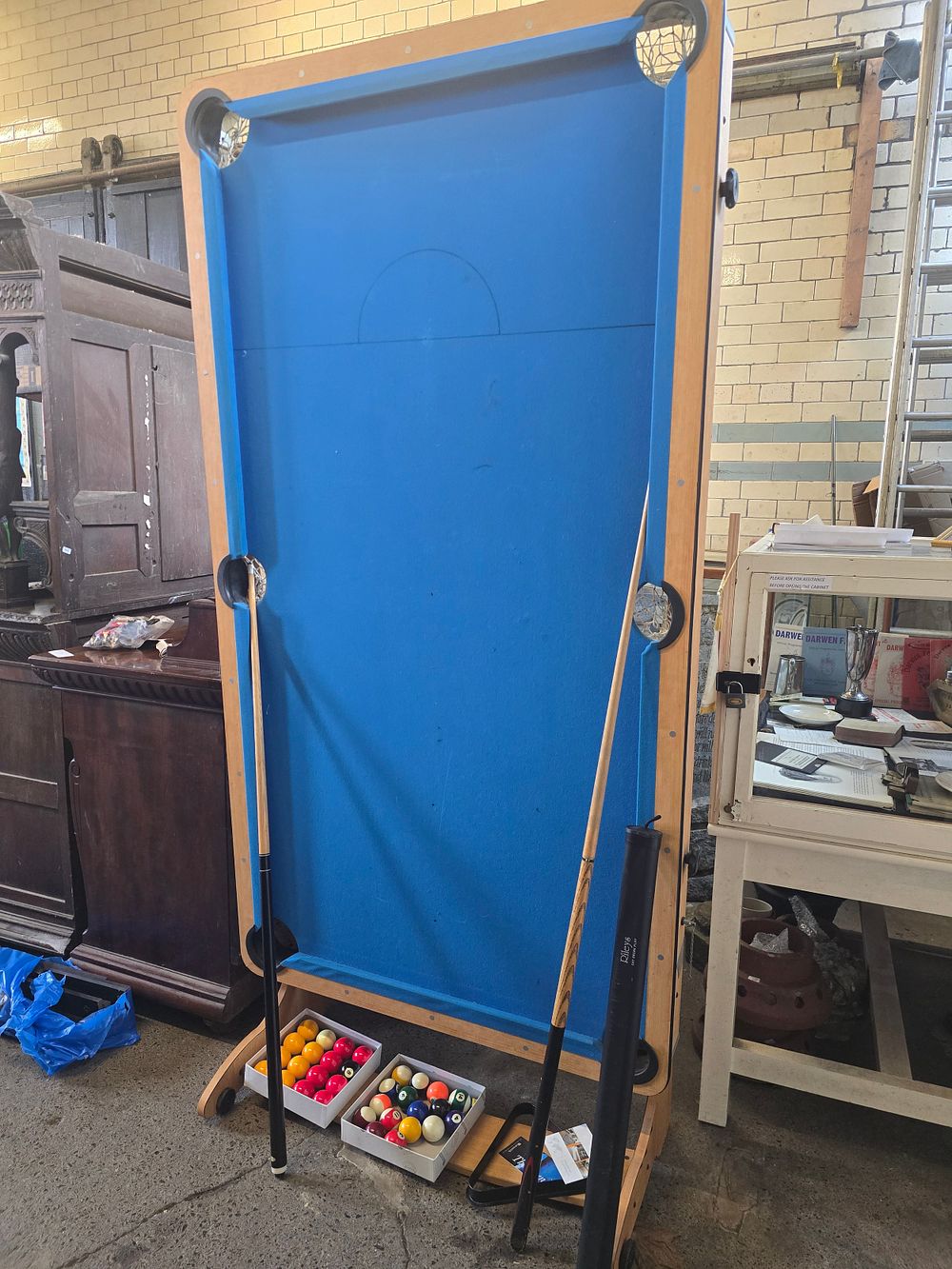 Lot 659: An easy store BCE sports pool table. With...