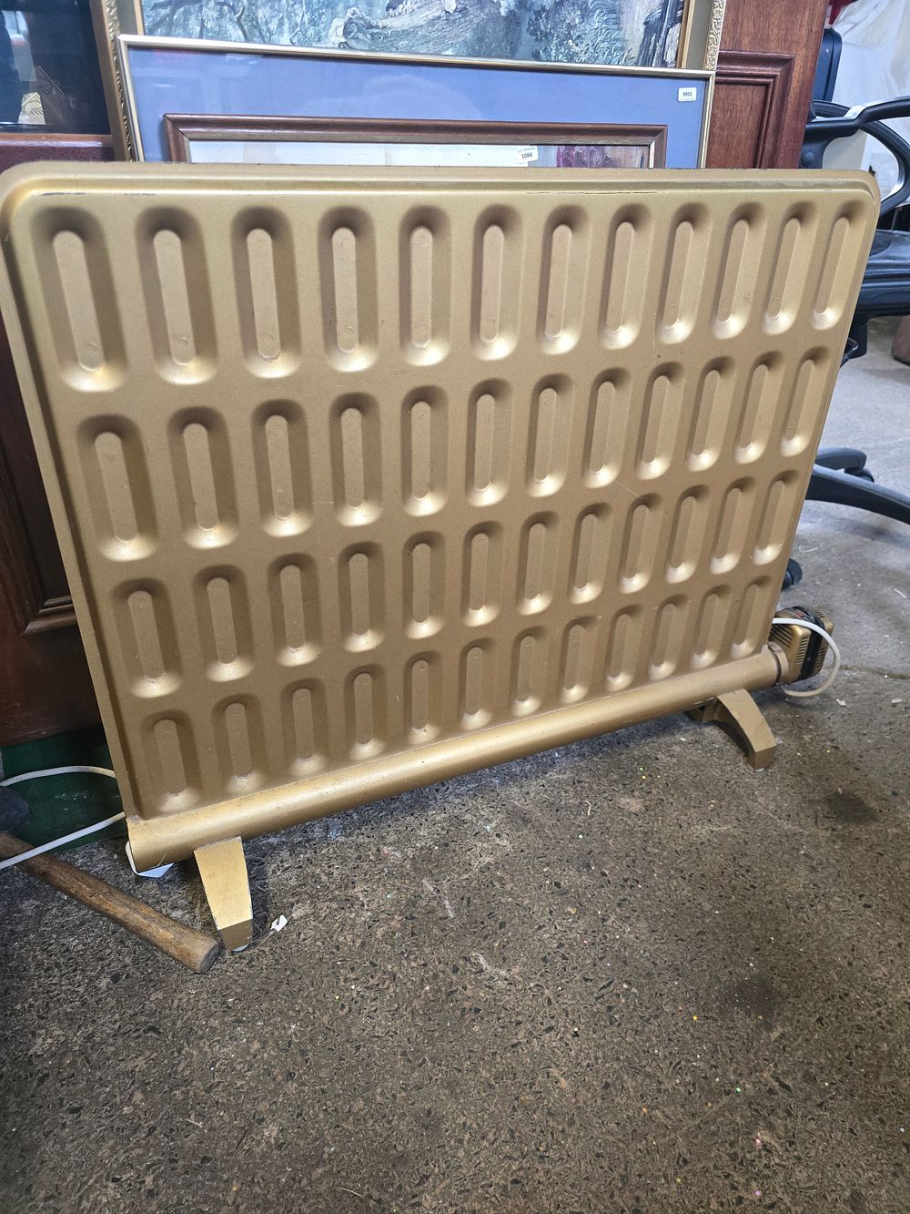Lot 660: Bronze coloured electric radiator