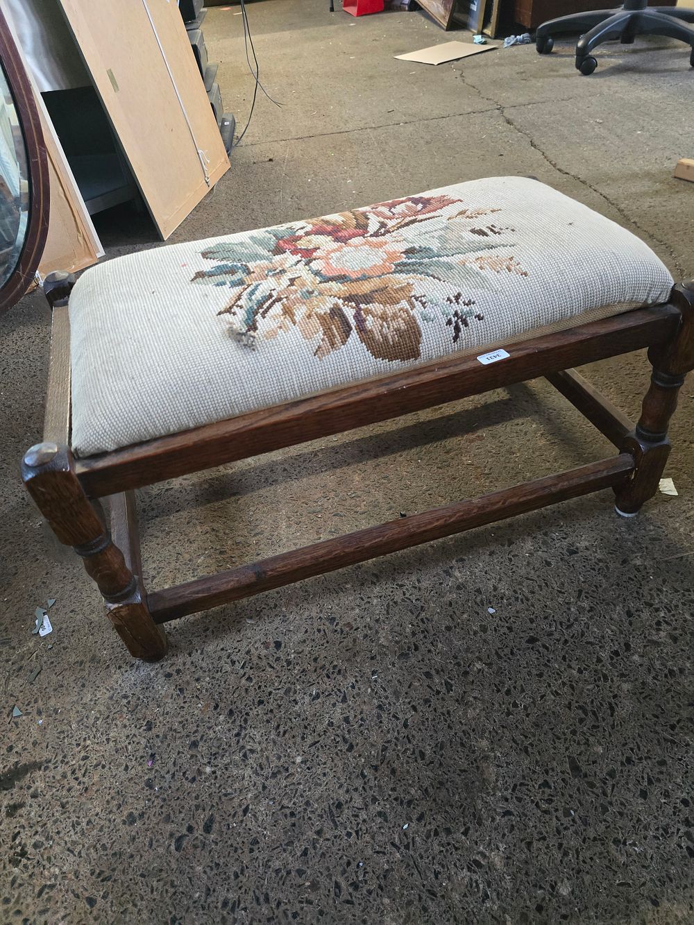 Lot 668: A long wood and tapestry foot stool