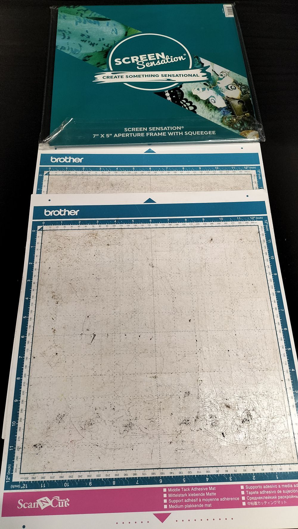 Lot 157: Screen Sensation 7" x 5" Aperture frame with squeegee and 2 Scan and cut middle tack adhesive mats 
