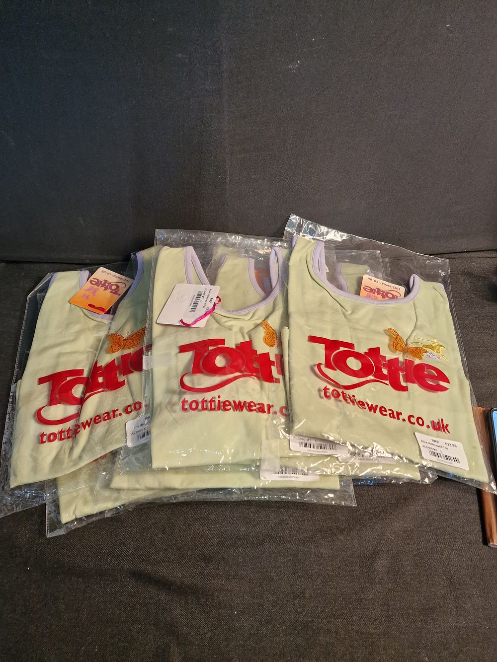Lot 164: 10 Brand New Tottie Halter Neck Tops in Green/Lilac RRP £13.99 Each Sizes Large & XL