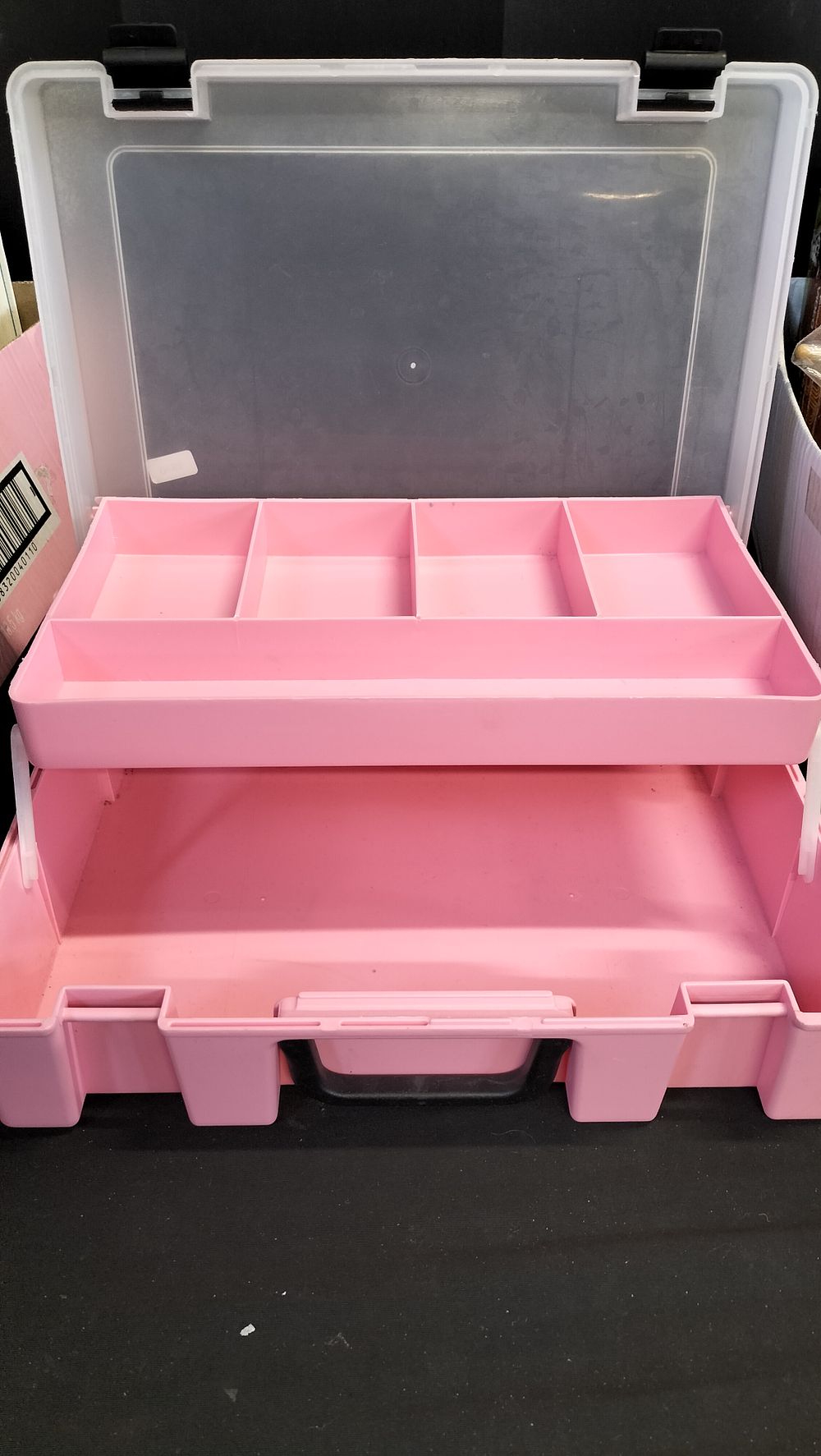 Lot 558: Pink multi layer storage box with lid 