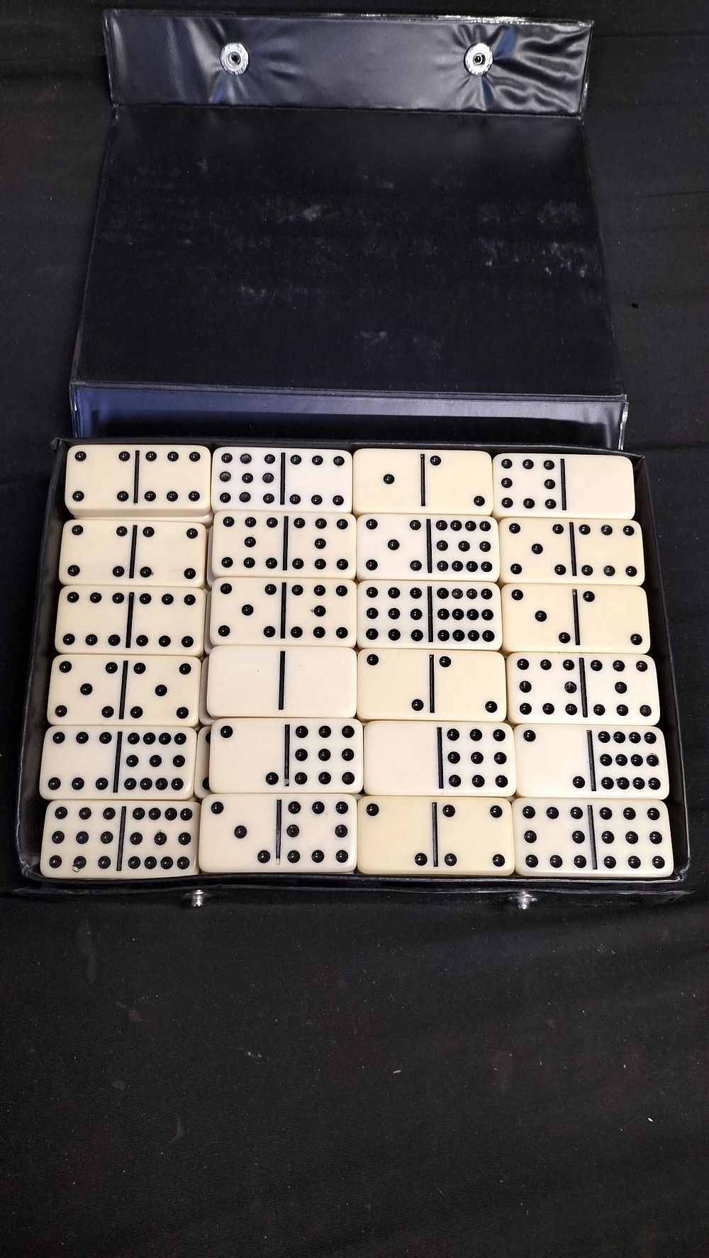 Lot 563: Set of 91 Double Twelve Dominoes in case 