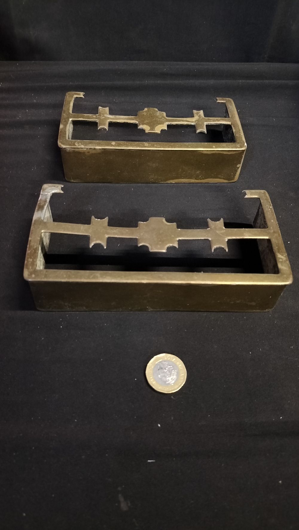 Lot 575: Pair of brass fender ornaments 