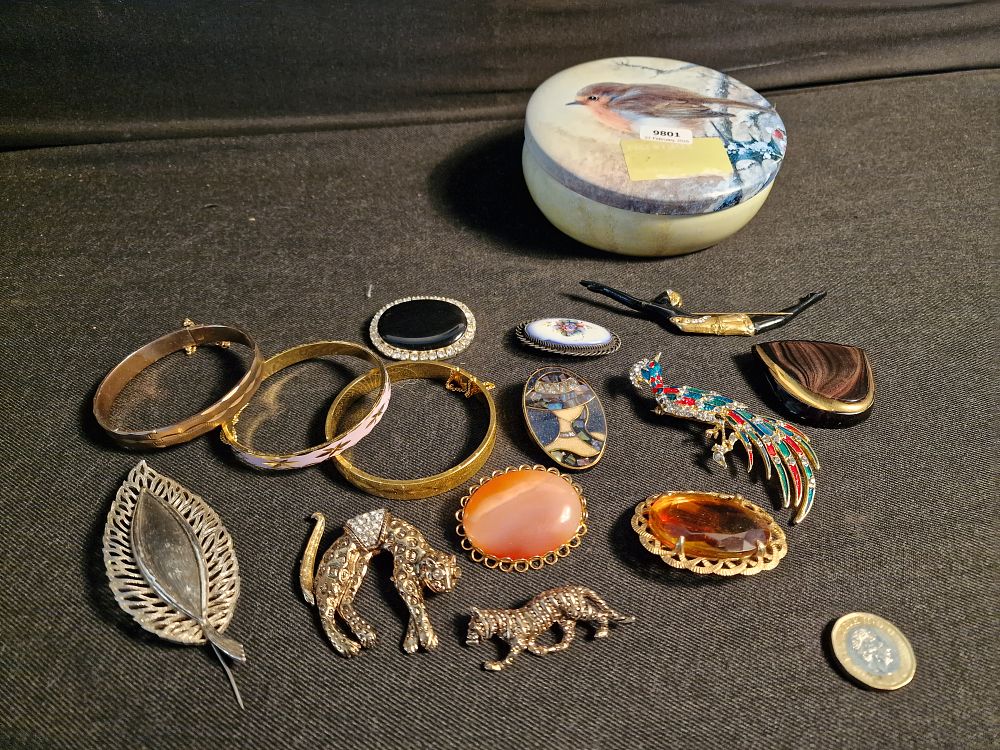 Lot 196: Selection of Brooches and Bangles in a Tin