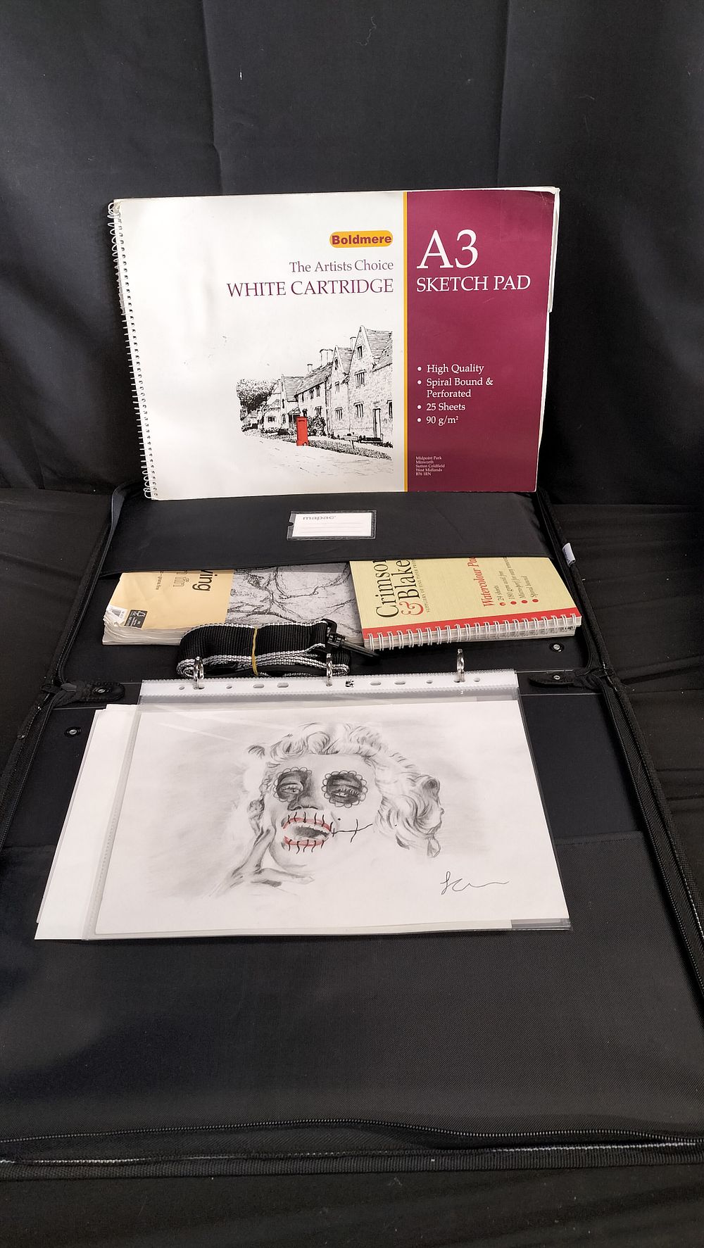 Lot 589: Macpac portfolio case with shoulder strap and contains...