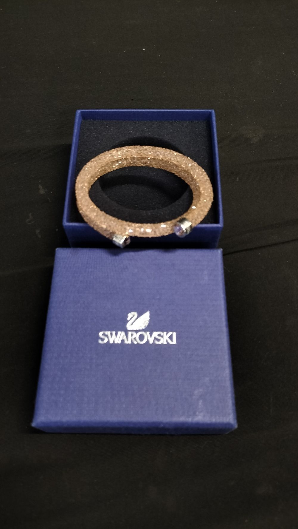 Lot 592: Swarovski. Crystal dust double wrap Bangle in pink