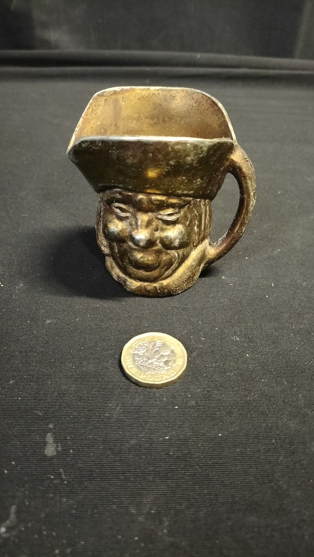 Lot 602: Small Vintage brass Toby jug 