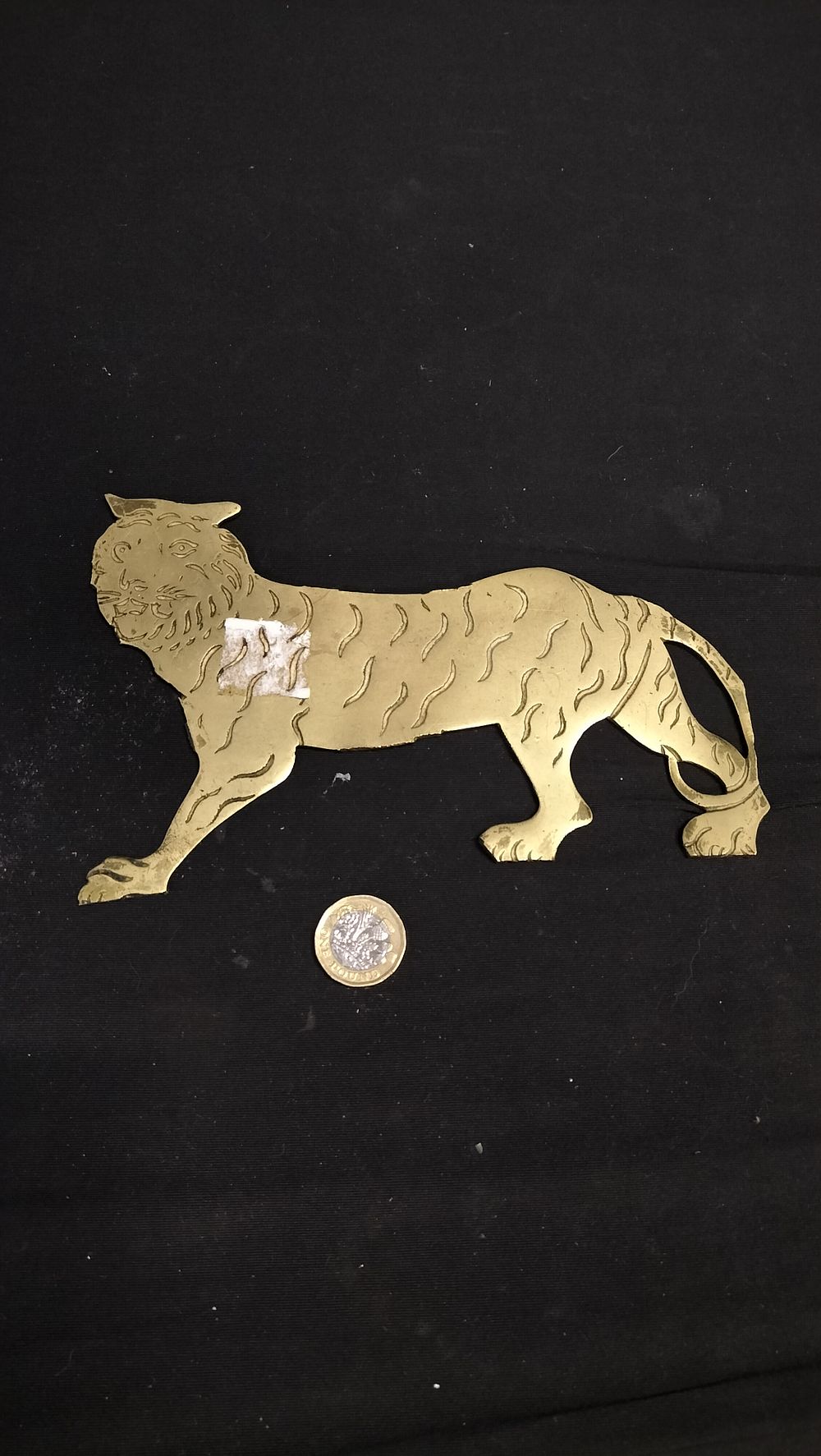 Lot 603: Flat brass tiger 