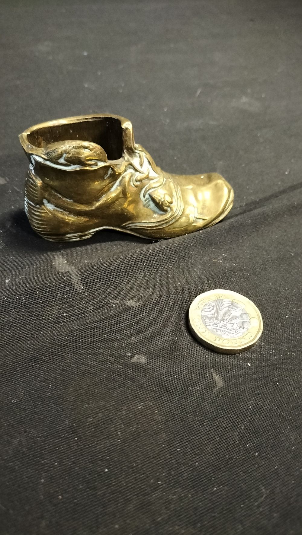 Lot 604: Brass boot match holder and striker 