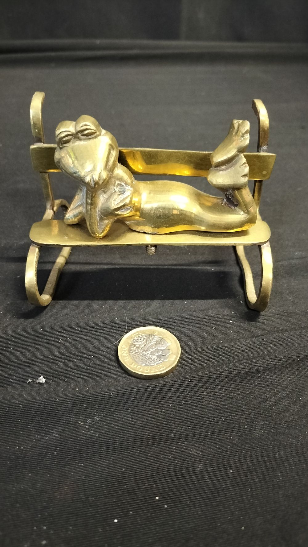 Lot 606: Brass frog on a bench a/f
