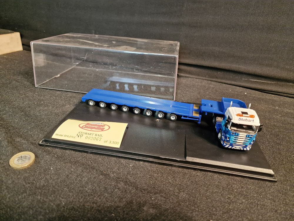 Lot 277: Oxford Diecast 1/76 scale model of an Eddie Stobart Rail Scania Highline Low Loader in Display Case