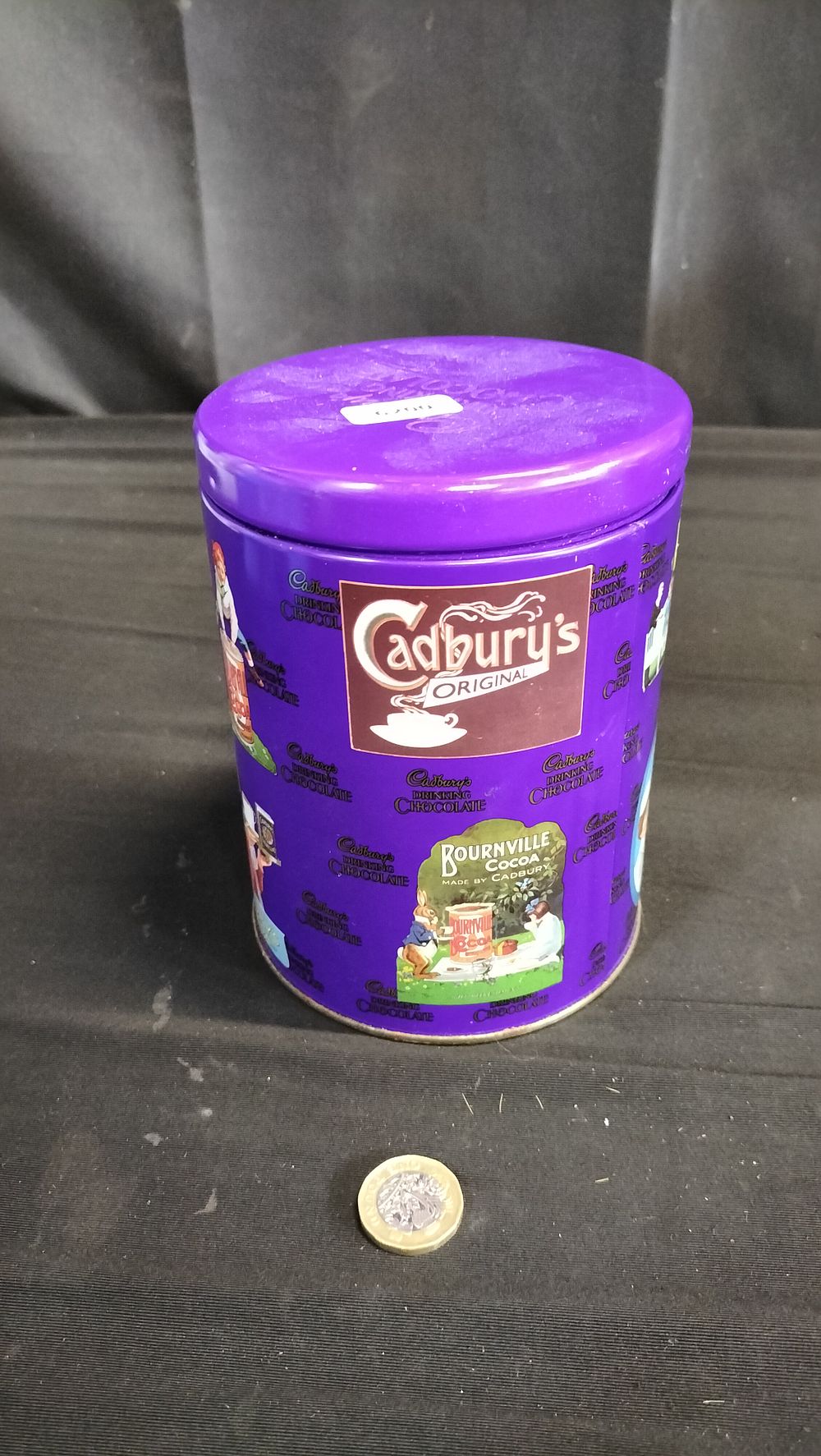 Lot 633: Cadbury's chocolate tin with vintage advertising 