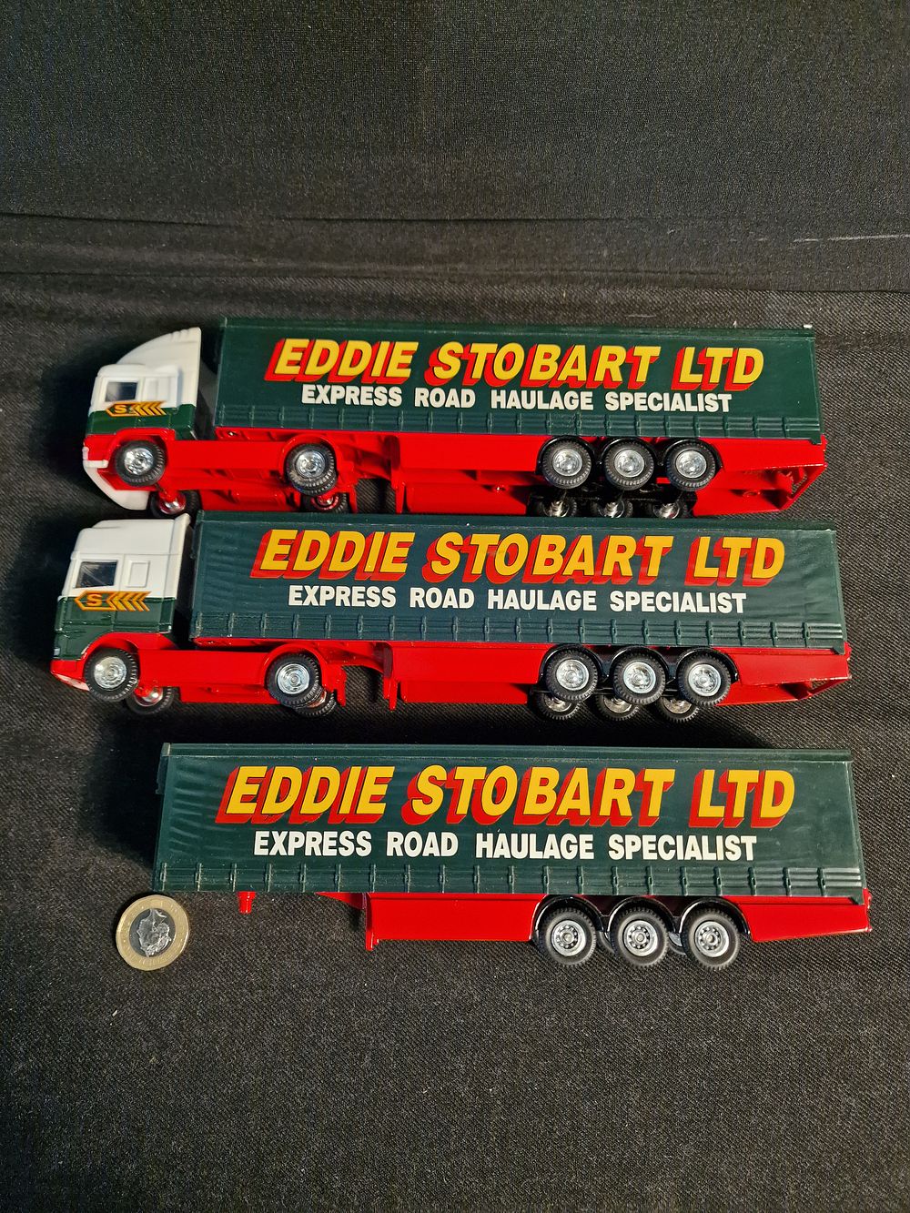 Lot 288: Eddie Stobart 1:64 Scale Trucks & Trainers Play Worn