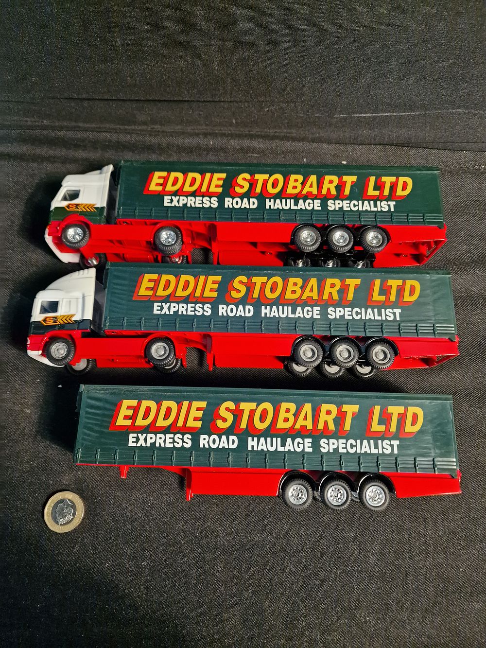 Lot 289: Eddie Stobart 1:64 Scale Trucks & Trainers Play Worn