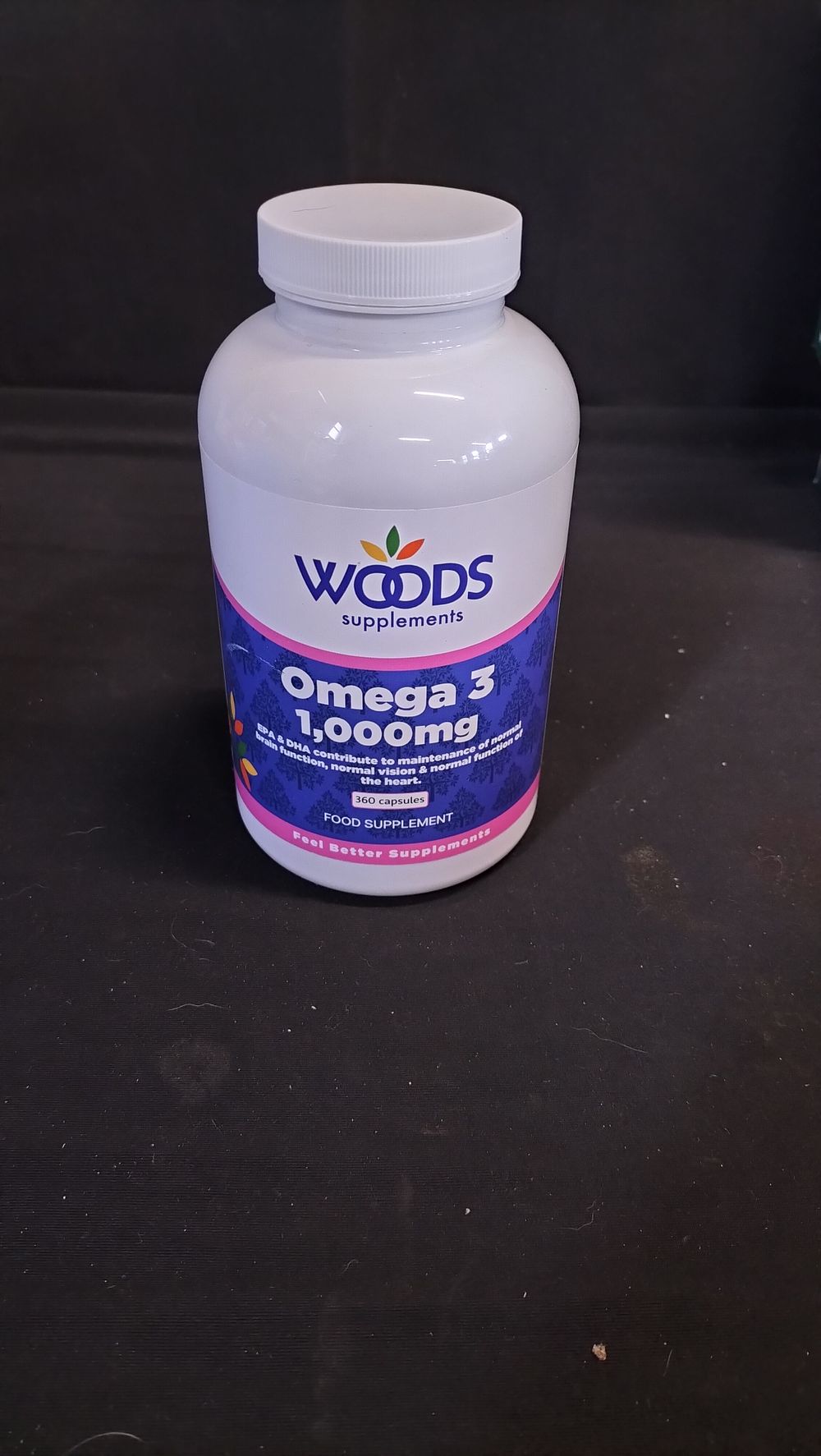 Lot 655: Opened tub of Woods Omega 3.  1, 000mg...