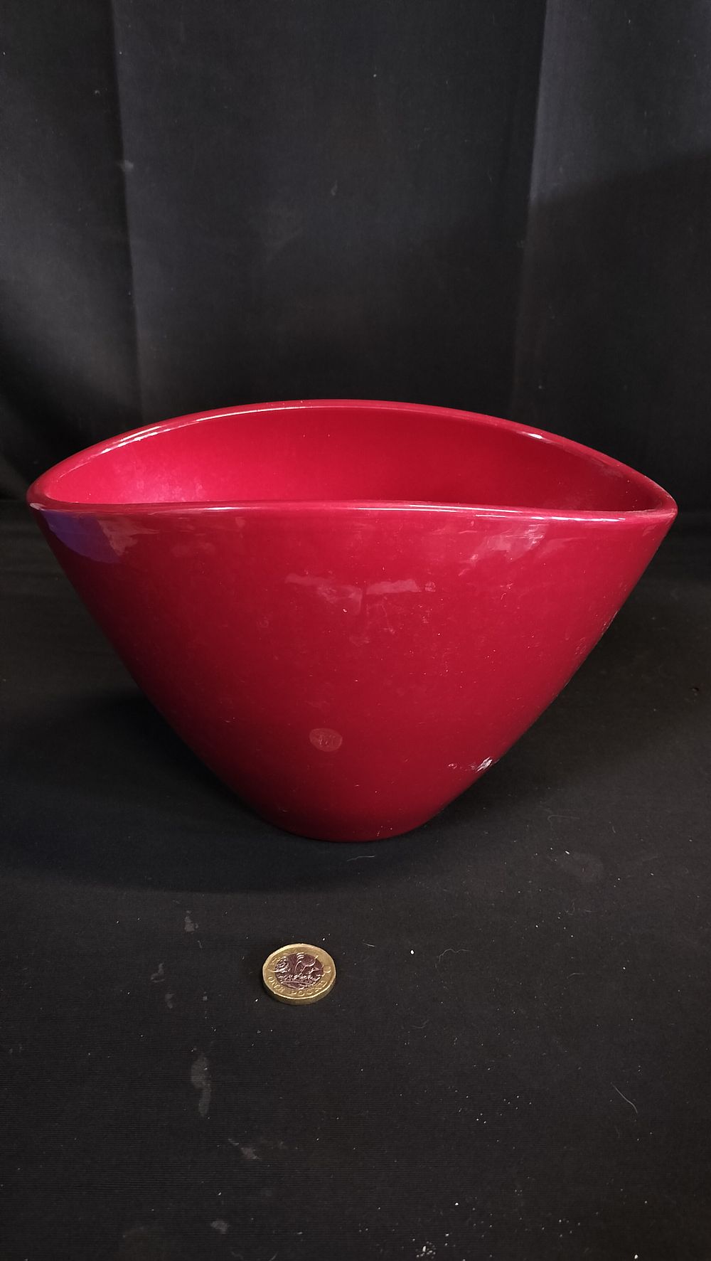 Lot 667: Red bowl vase 