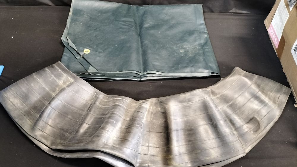 Lot 691: Ground sheet and car inner tube 