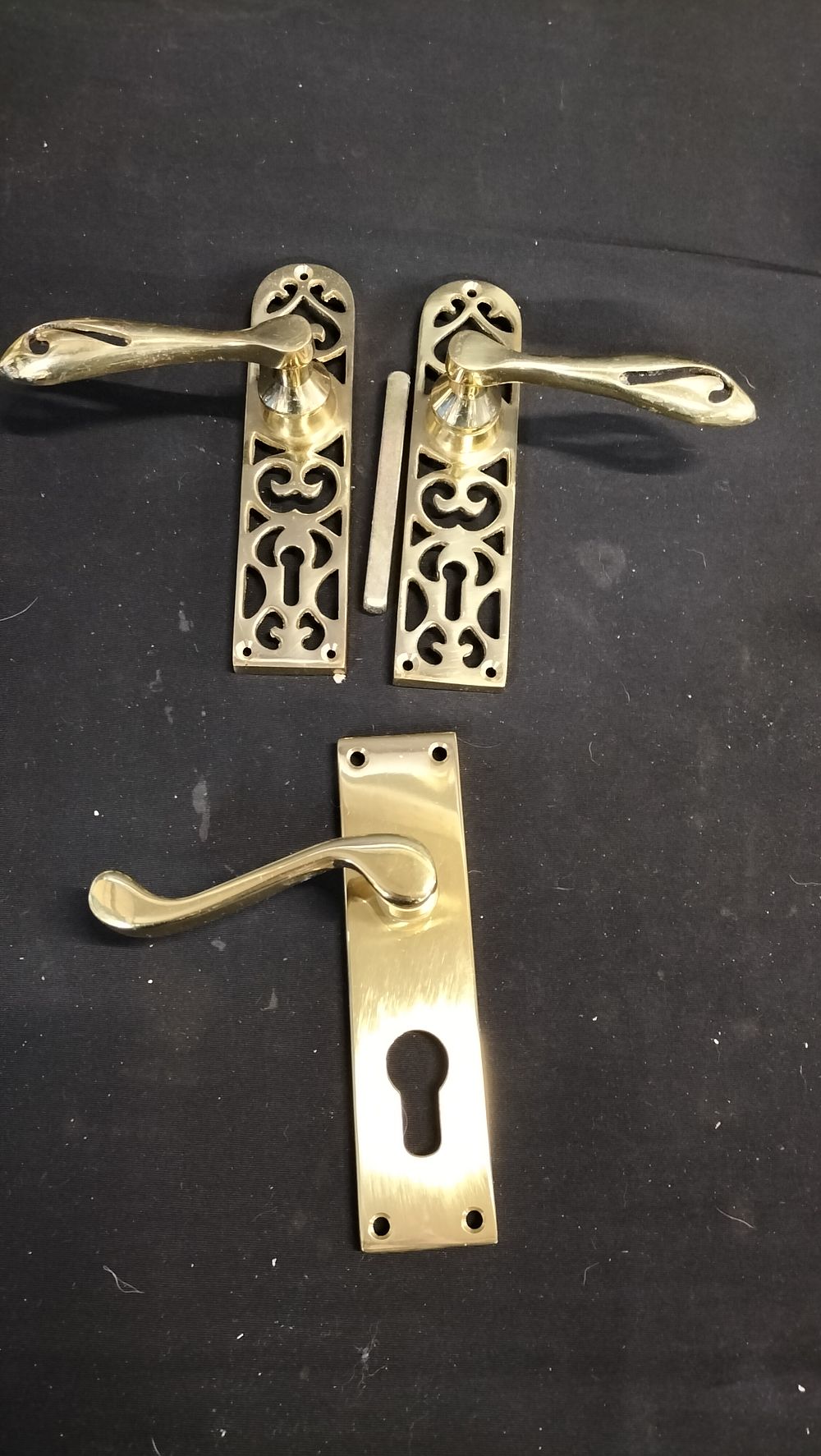 Lot 752: 3 brass door handles 
