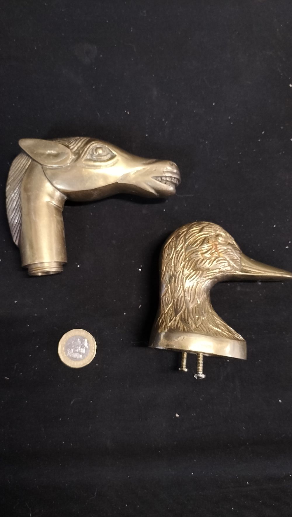 Lot 753: Two brass animal heads duck and horse
