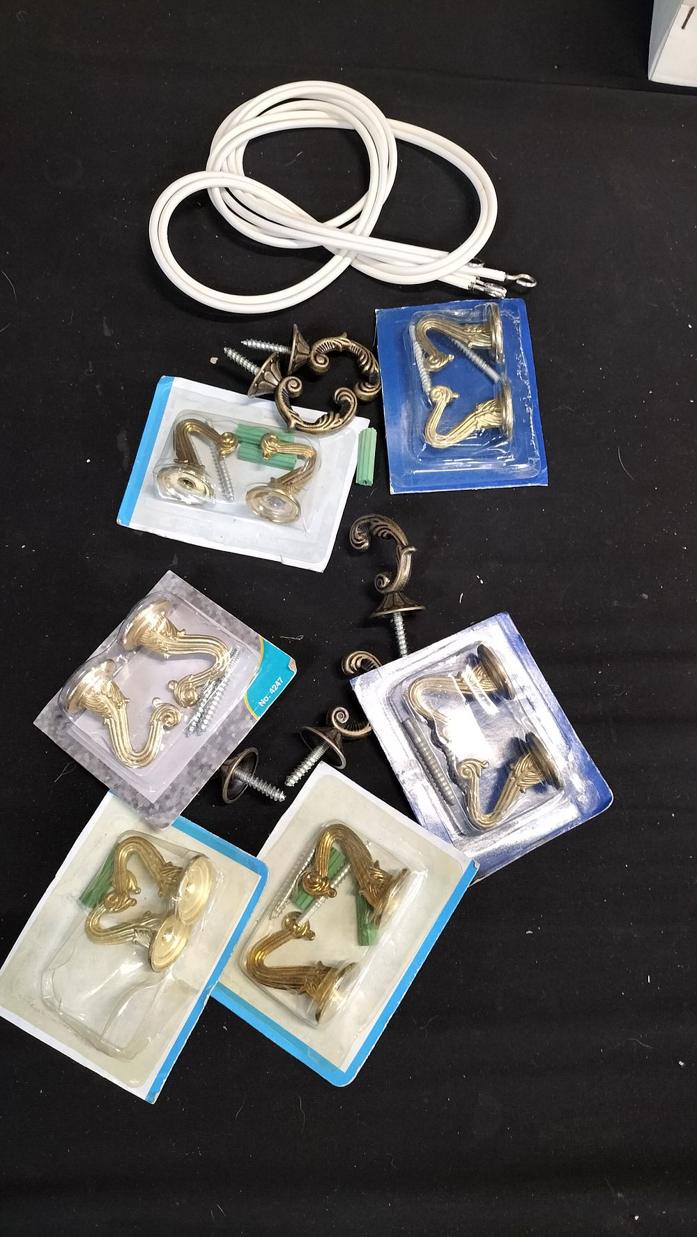 Lot 754: Bag of curtain wire, and hooks 