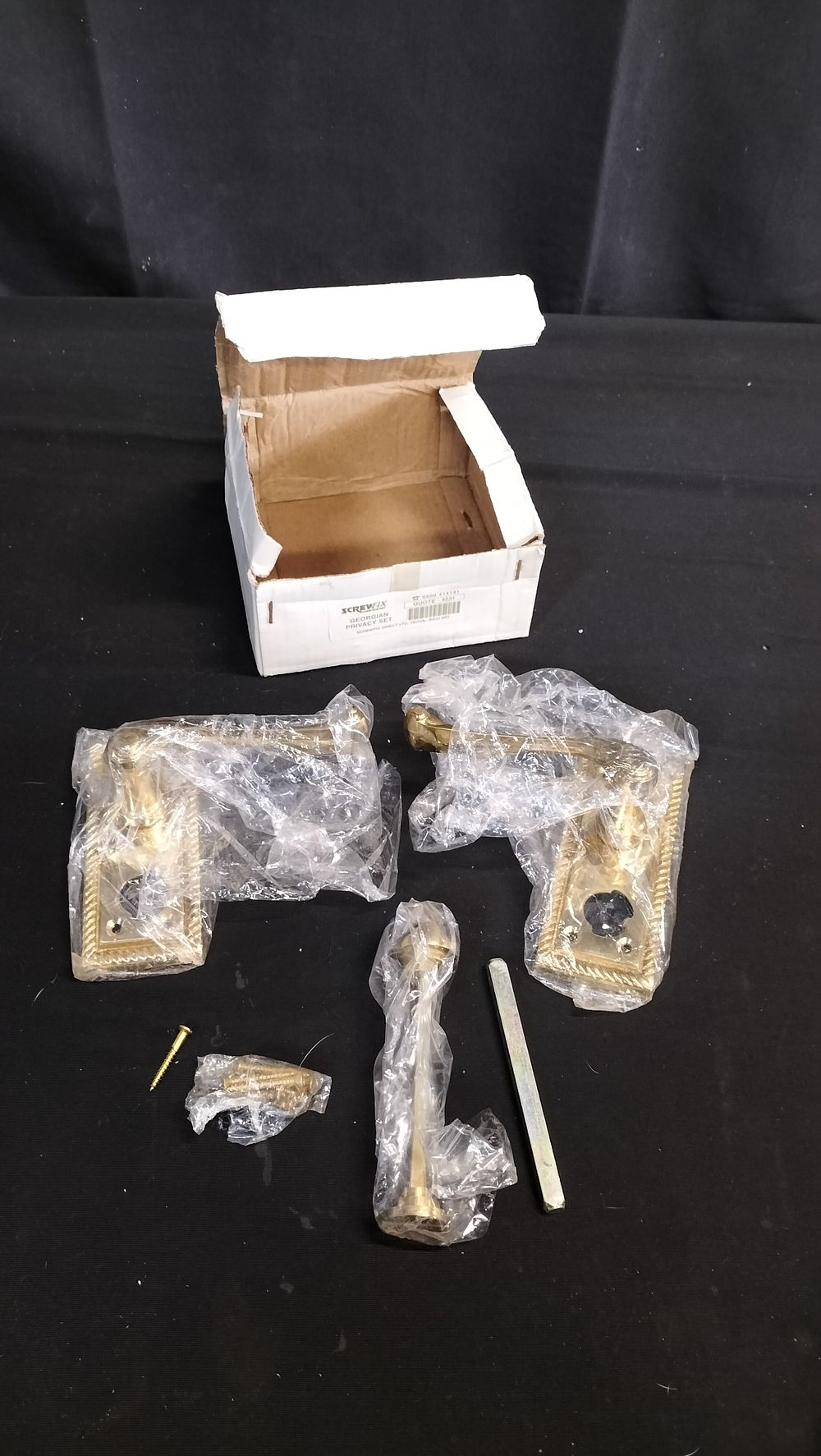 Lot 760: 2 brass door handles and hardware 
