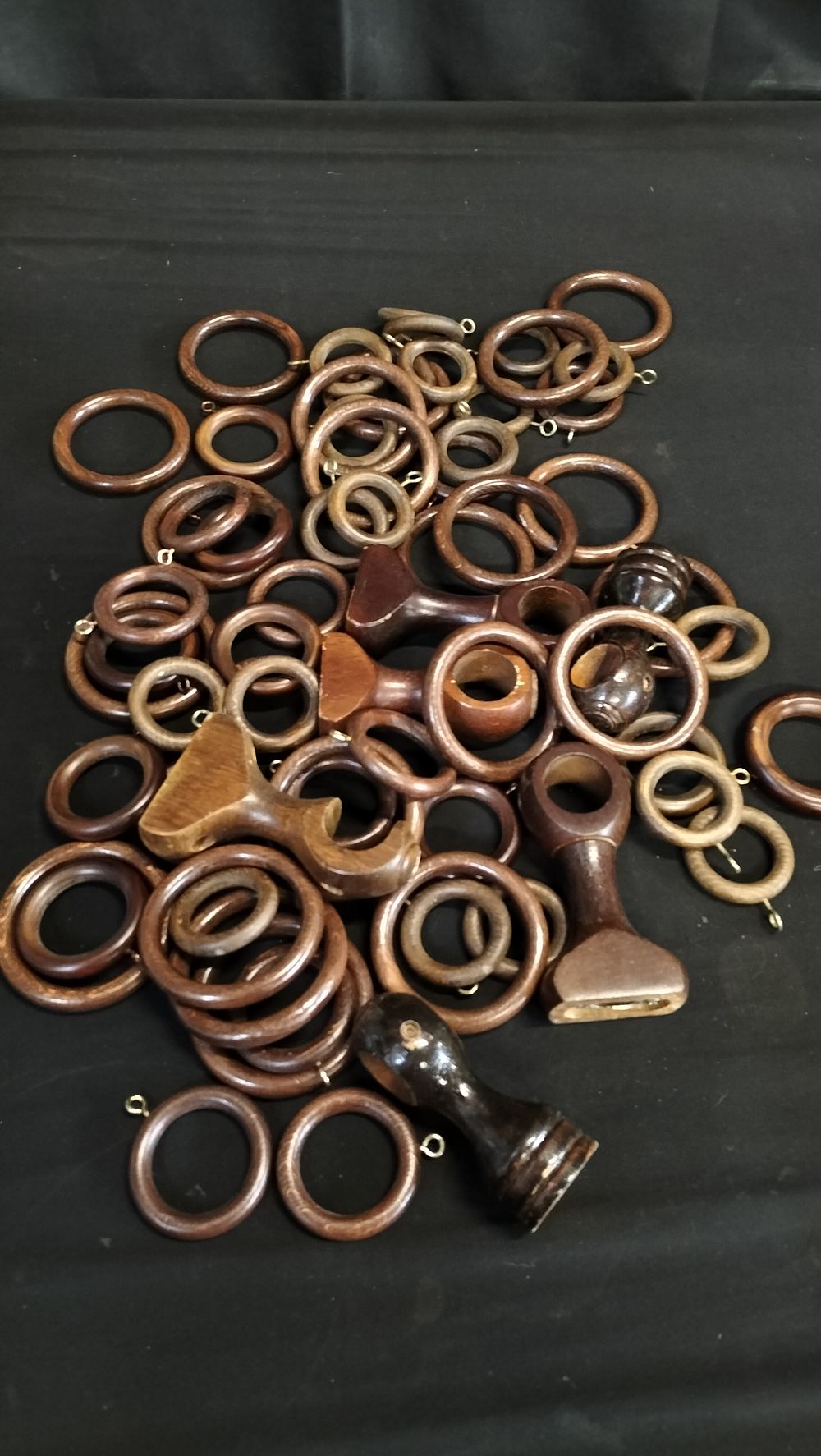 Lot 768: Various wood curtain rings and brackets 