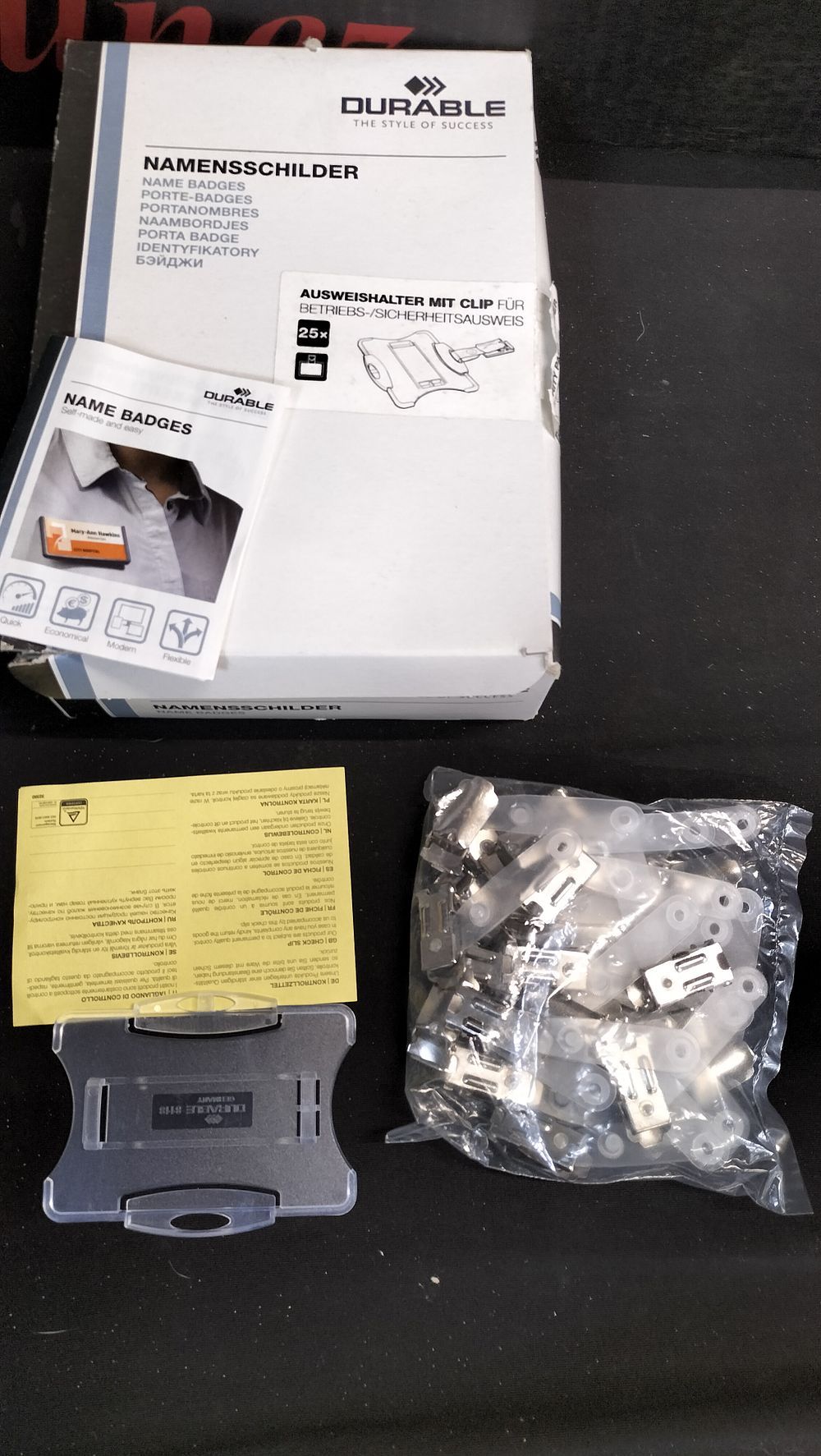 Lot 791: Box of 25 clear name tags 