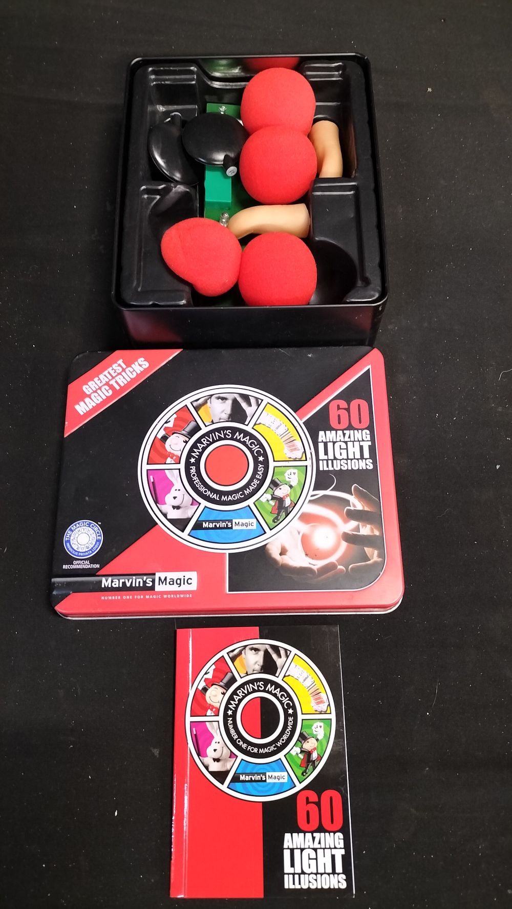Lot 799: Tin of Marvin's Magic illusions 
