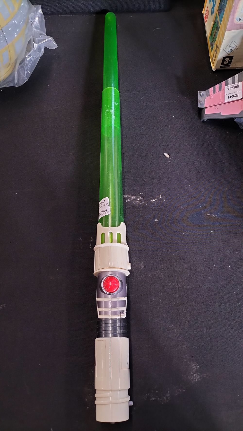 Lot 628: Star Wars General Grievance light saber. Tested for...