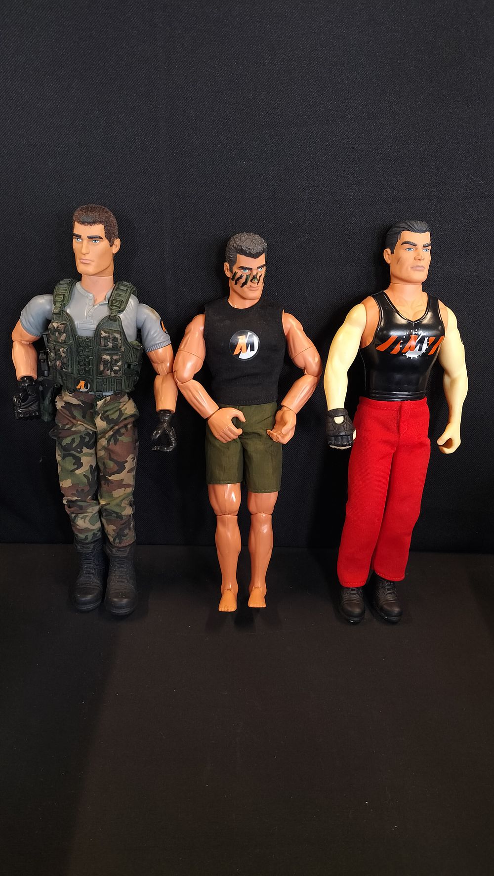 Lot 653: Three Action Man figures 
