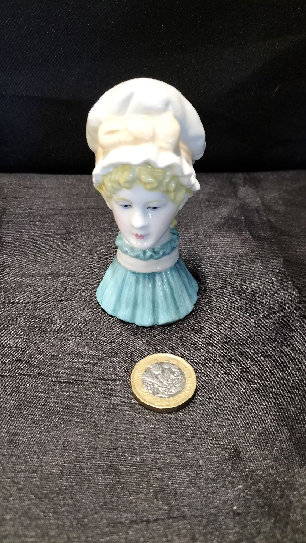Lot 679: Royal Worcester porcelain mob cap figurine 