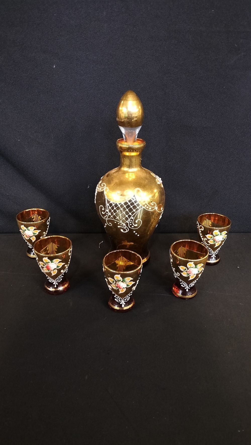 Lot 685: Bohemian amber glass decanter and 5 small glasses 