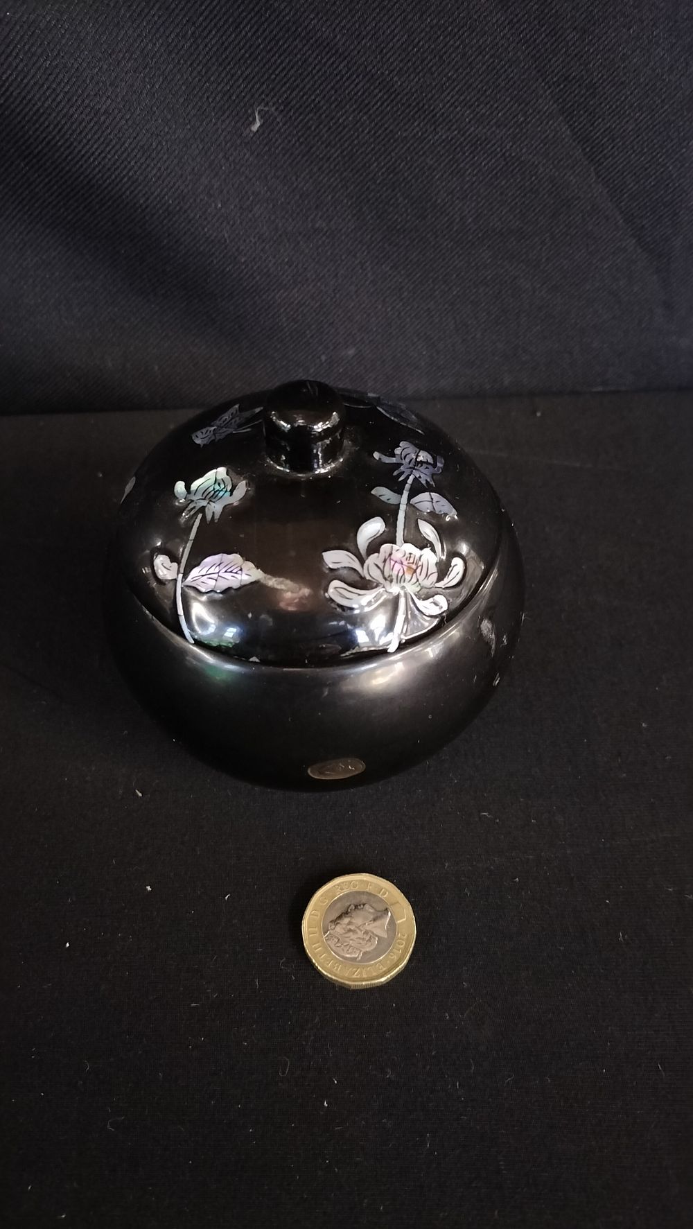 Lot 694: Black trinket dish with mother of pearl floral...